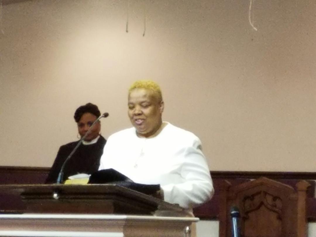 Tina Greene ministering from the pulpit